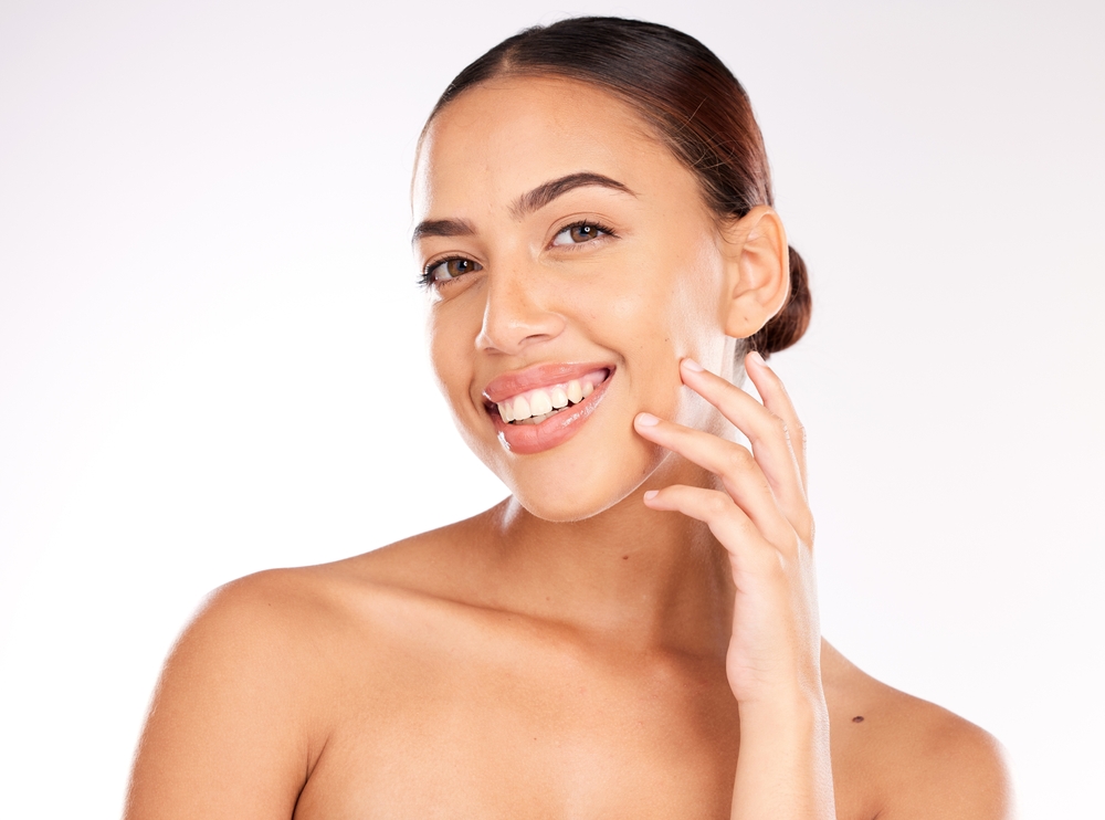 Woman with smooth, glowing skin after Morpheus8 treatment.